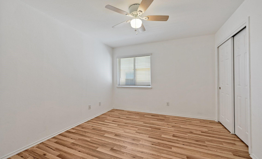 Pergo wood laminate flooring eliminates carpet throughout the home.
