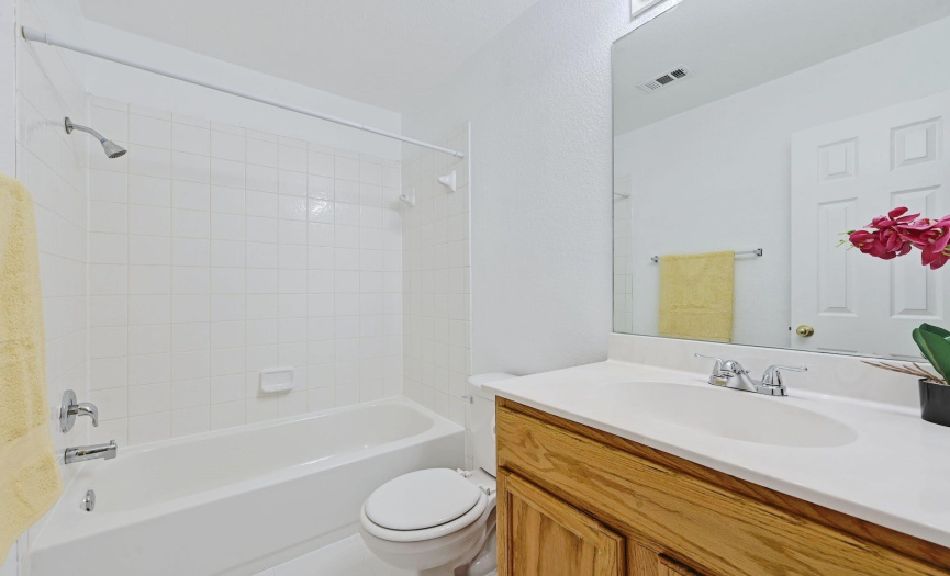 The shared full back is equipped with a shower/tub combo. All plumbing fixtures have recently been replaced.