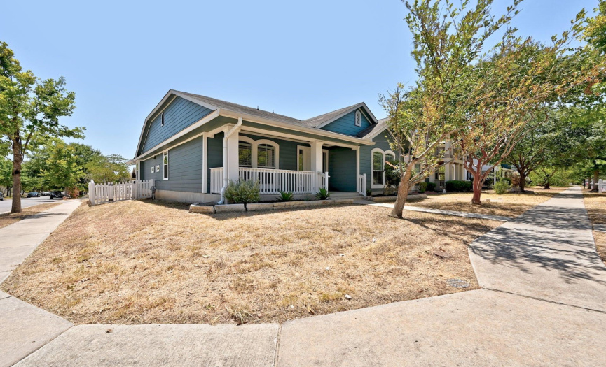 Set on a desirable corner lot with a rear-facing garage, the front of the home exudes curb appeal.