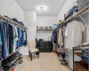 The walk-in closet provides tons of space for your wardrobe and more.