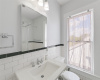 An en suite bathroom located within one of the upstairs bedrooms