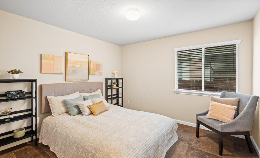 The two secondary bedrooms are sizable, with quick access to the full bath outside their doors.