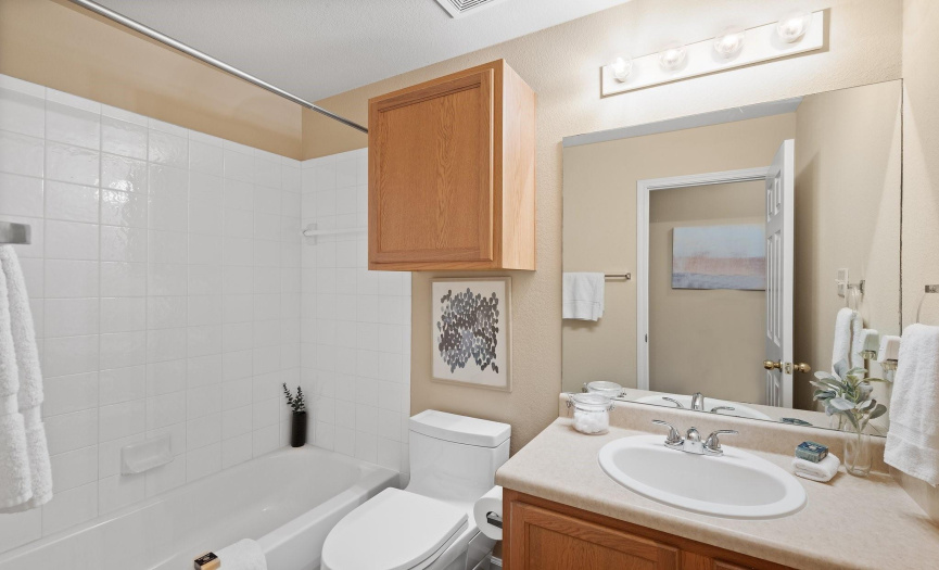 The guest bathroom is centrally located for access from the secondary bedrooms and for guests.