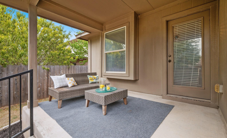 The backyard serves as a private oasis, featuring a large back patio.