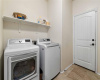 The in-home laundry room is located at the garage entry. 