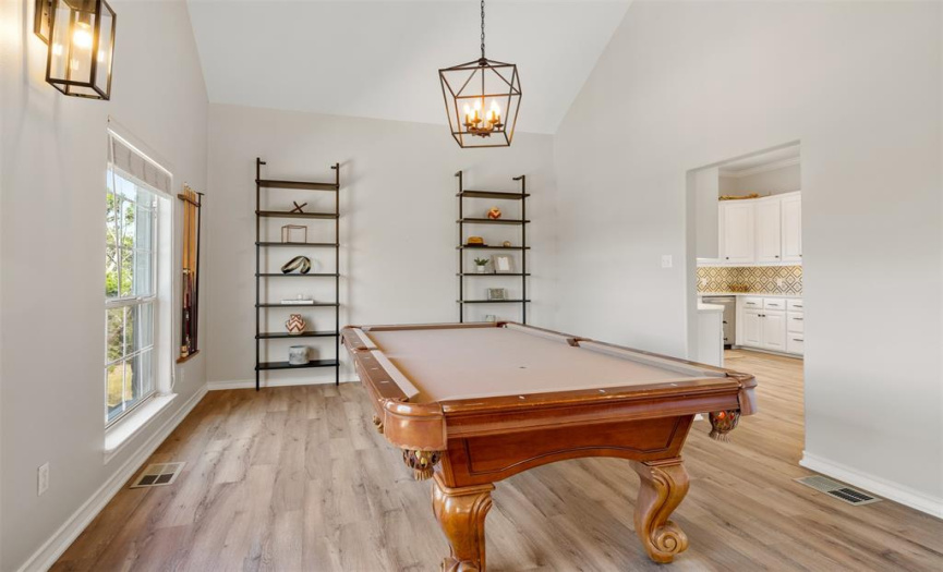The formal dining is spacious enough for all kinds of entertaining and features built in bookshelves. 