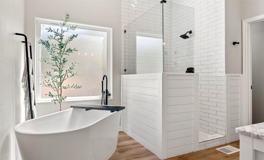 Indulge in the master bathroom soaking tub with separate shower. 