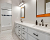 Large, updated secondary bathroom with dual vanity. 