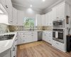 The updated kitchen offers ample storage. 