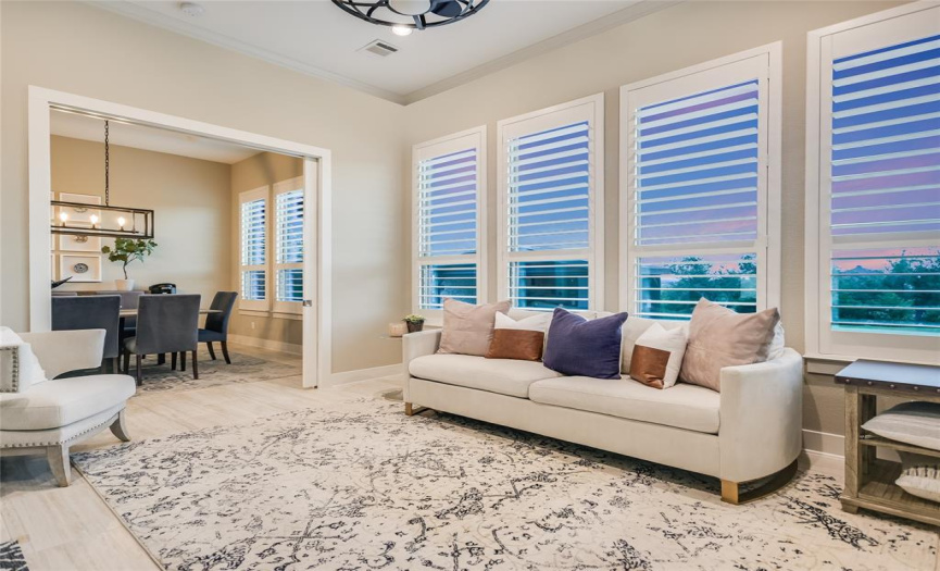 The sunroom is sure to delight, as this light-filled, happy space can also serve as a first-floor game room, another office space, or a 6th bedroom.  