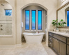 The primary bathroom was designed to pamper, with a soaking tub, dual vanities and large walk-in shower.