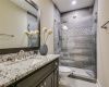 All four upstairs bathrooms are equipped with granite countertops.