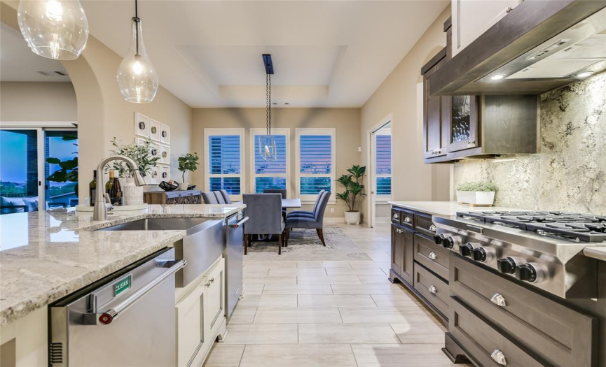 Equipped with 2 dishwashers, top-of-the-line appliances, and a “working” pantry, you will love the upscale and practical features of the kitchen.  