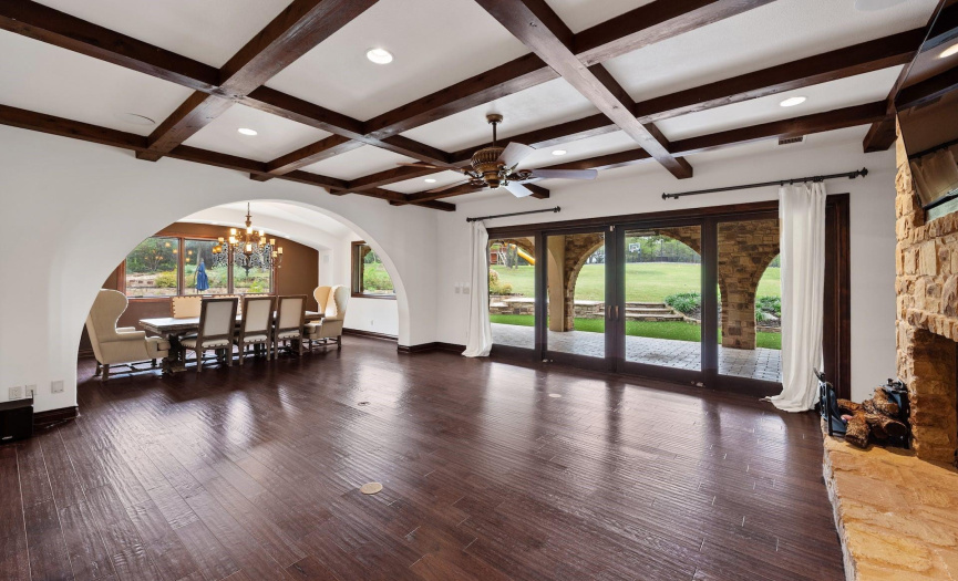 living room features beautiful wood beams