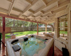 Beautiful extensive covered back patio with hot tub!
