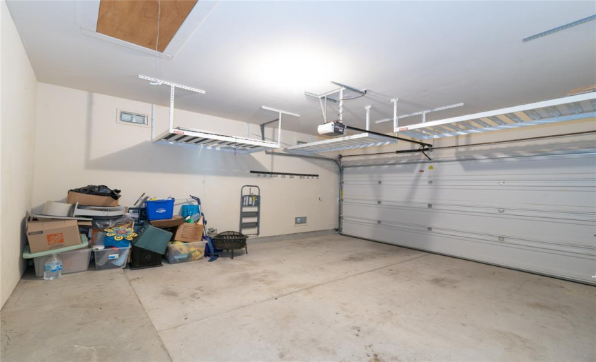 Check out the above head storage in this garage. 