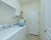The utility room is found near the garage in this Cambridge floor plan.