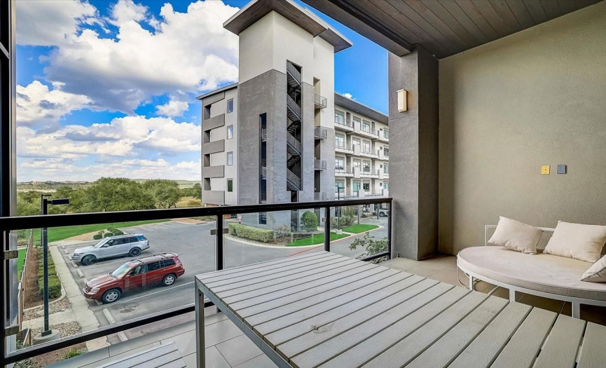 Large Balcony with metal/glass railing. Cable hookups on wall for mounting a TV. Lounge outside and enjoy the view while watching your favorite TV shows. 
