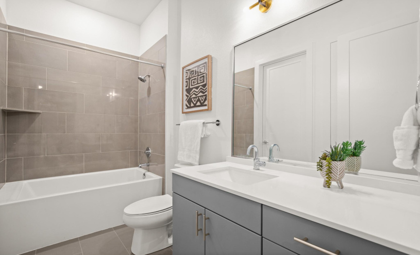 The full guest bathroom offers convenience and is well-appointed for your visitors.