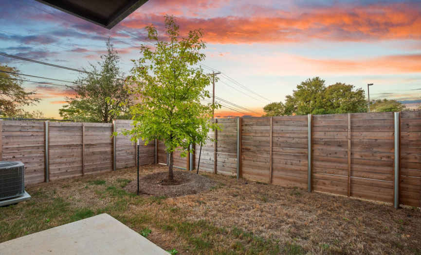 The private backyard offers a serene escape with plenty of space for outdoor activities.