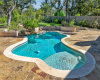 Take a relaxing dip in the pool. There is a large umbrella that will cover the 