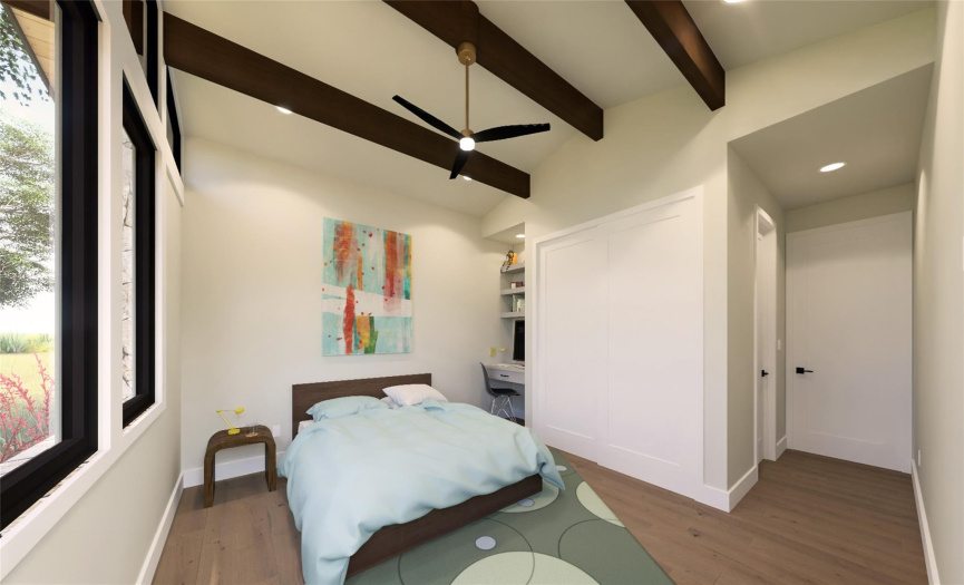 All of the home’s secondary bedrooms include a custom built-in desk with open shelving, custom transom windows, exposed beams, and an en-suite bathroom!