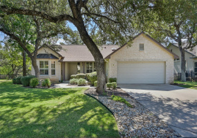 Classic Del Webb charm and curb appeal with this Trinity floor plan home on a DEEP Sun City greenbelt lot!
