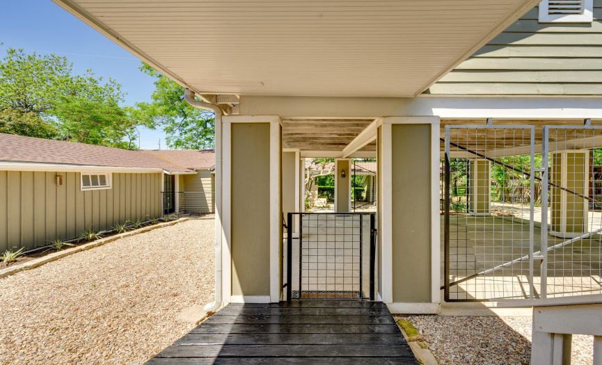 Covered walkway to carport and back guest house