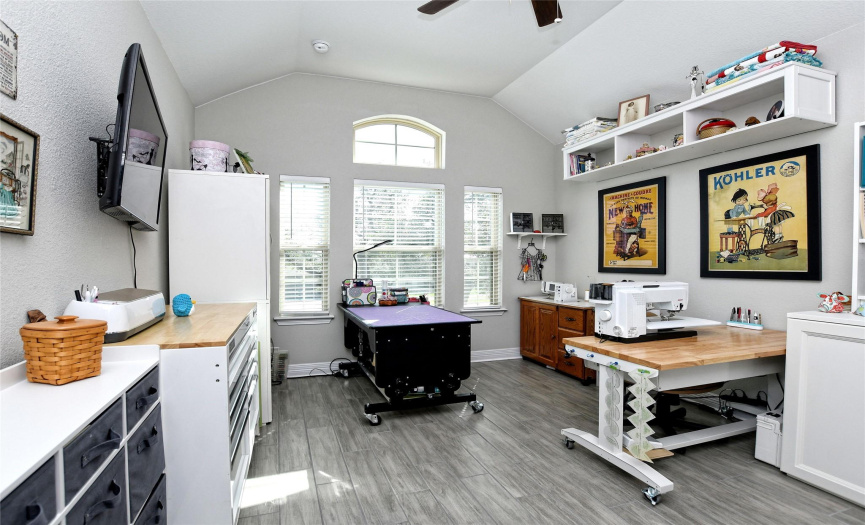 bedroom being used as a craft room
