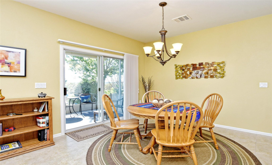 Dine just steps away from screened back porch.