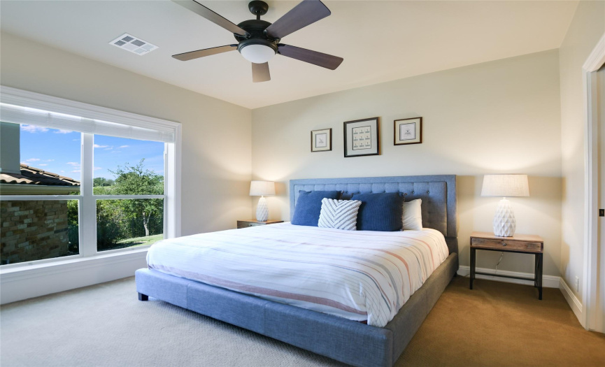 Enjoy the opportunity to personalize the neutral toned walls in this lower level bedroom 5 with a private bathroom.