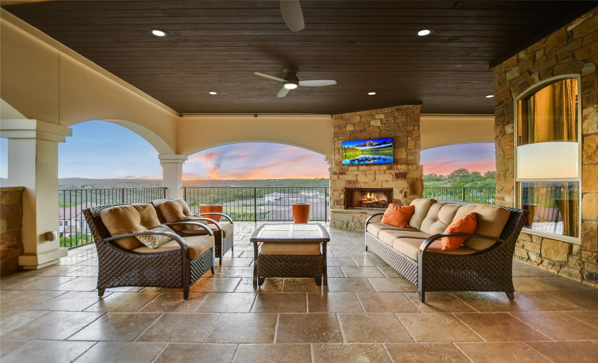 The main level covered patio offers unparalleled views of the Austin hill country and Lake Austin.