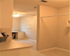 Laundry room hosts tons of space, cabinetry, countertops 