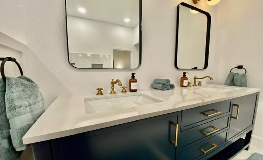 Close-up of the beautiful new vanity with double sinks.
