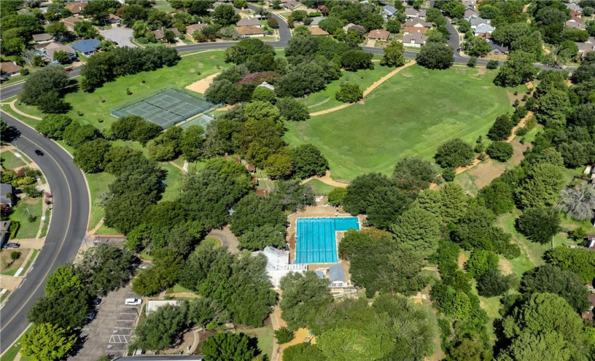 Aerial view of the community pool, park and courts. Just a 5 minute walk from the home.