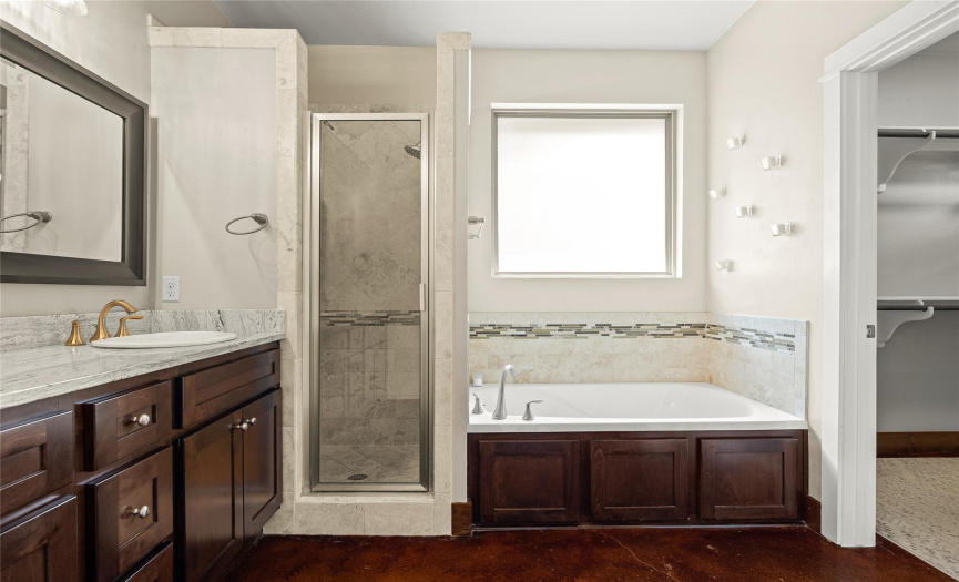 Dual sink vanity with granite counters. Huge walk-in closet in the primary suite.