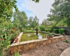 Above ground pond offers a tranquil setting in the backyard