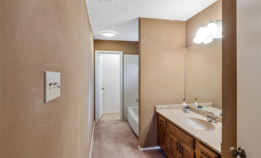 Primary bathroom with a separate private water closet.