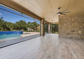 Imagine spending time on this 680 sq. ft. screened porch with panoramic views of your pool and yard.