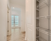 Mud room has additional storage with racks to store 