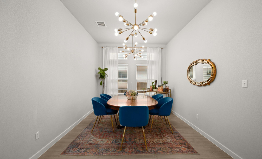 formal dining open to living and kitchen