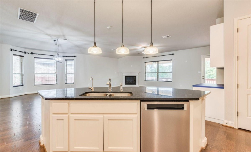 Chefs Kitchen Features Granite Counters, Stainless Appliances, Gas Cooktop, Built In Oven & Microwave, Oversized Island With Breakfast Bar