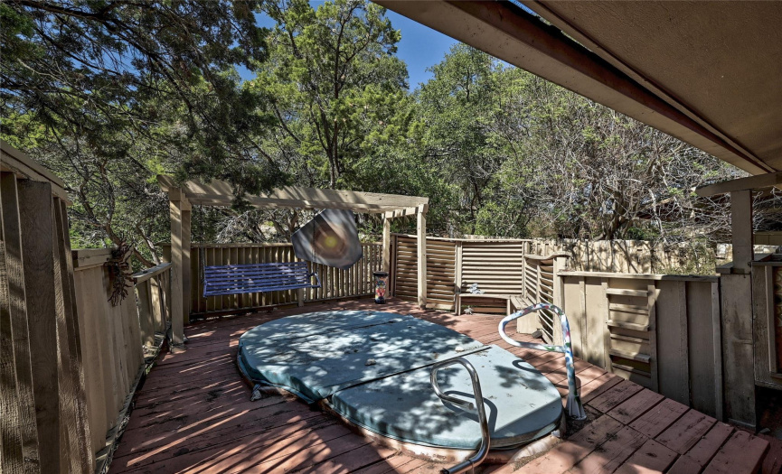 Hot tub and deck off primary bedroom