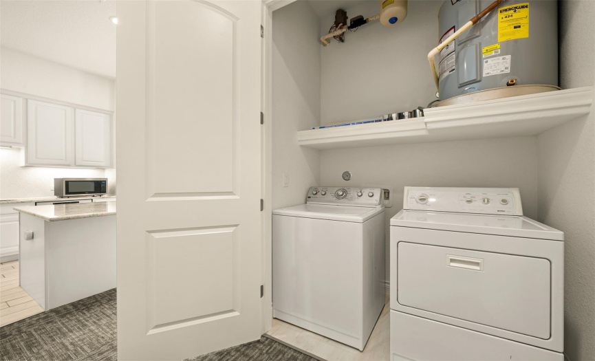 Laundry closet in condo Washer & Dryer convey