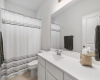 The guest bathroom is tastefully designed for the utmost in comfort and style.