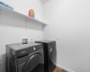 The laundry room provides built-in shelving, making laundry day a breeze.