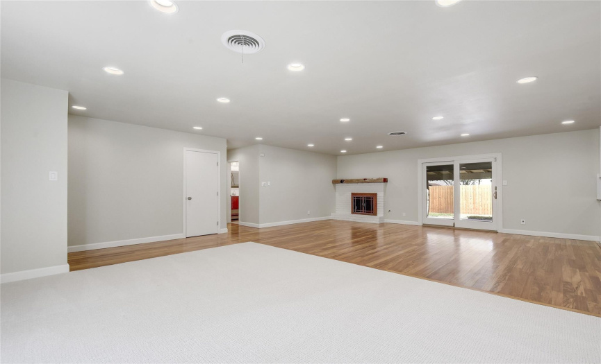 Plenty of space in this open concept. Coat closet in entry hall.