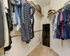 This large walk-in closet extends off the ensuite bathroom. 
