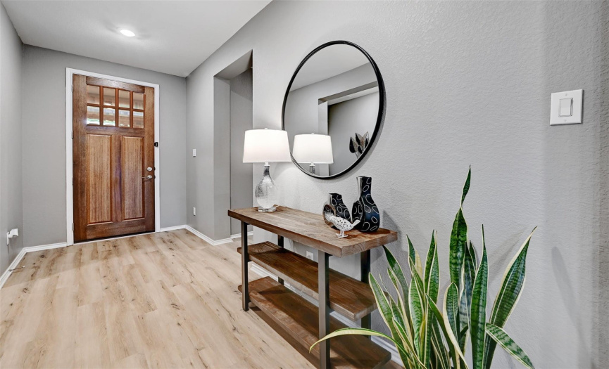 As you walk in the front door, you are greeted by the perfect entry way.