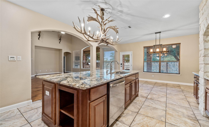 This open kitchen overlooks the family room.